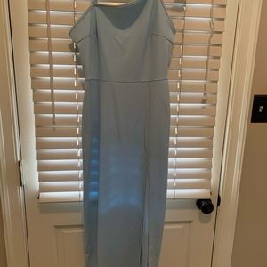 Brand new, never worn pretty slip dress with front split. Is to small.